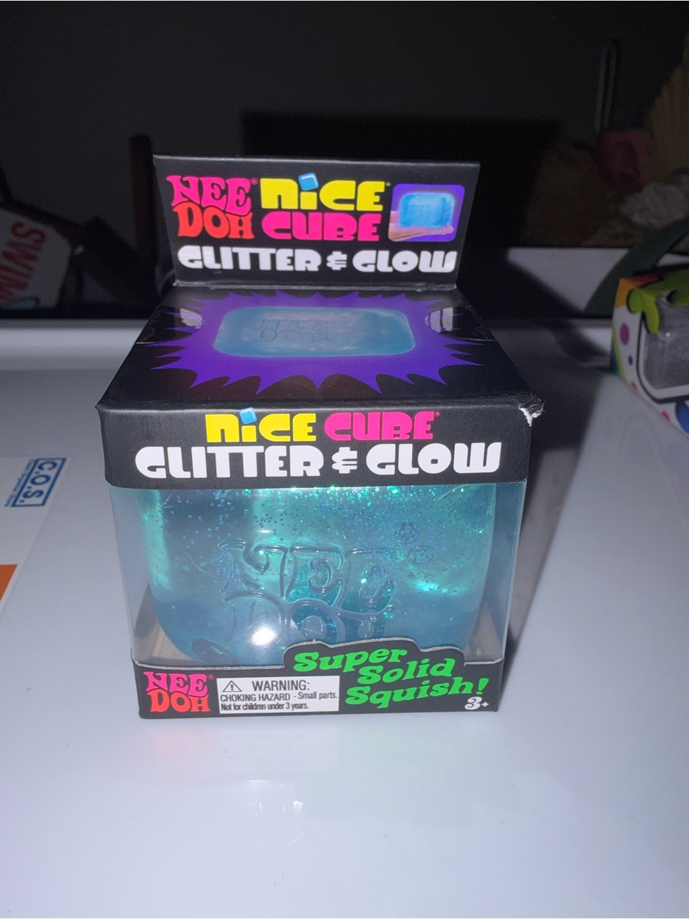 Authentic NeeDoh Nice Cube Glitter & Glow Squish Toy - Blue Glitter
